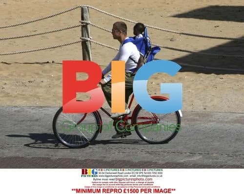 Brad Pitt and children cycling in Namibia