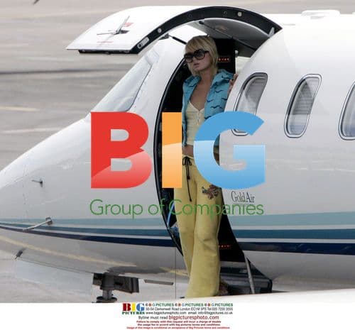 Paris Hilton and boyfriend on Riva speedboat in Cannes