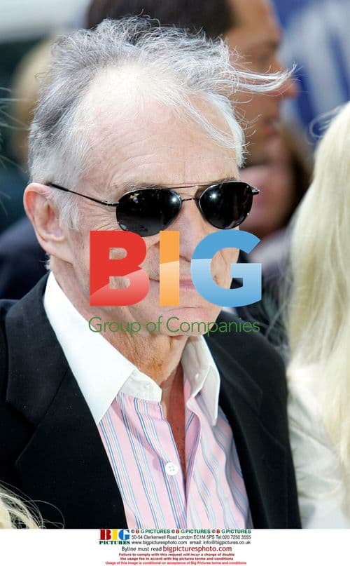 Playboy Hugh Hefner and Girlfriends at Book Signing