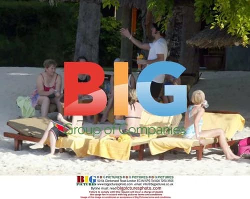 Liam Gallagher and Nicola Appleton on Caribbean Beach