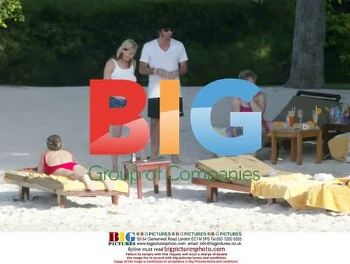 Liam Gallagher and Nicola Appleton on Caribbean beach