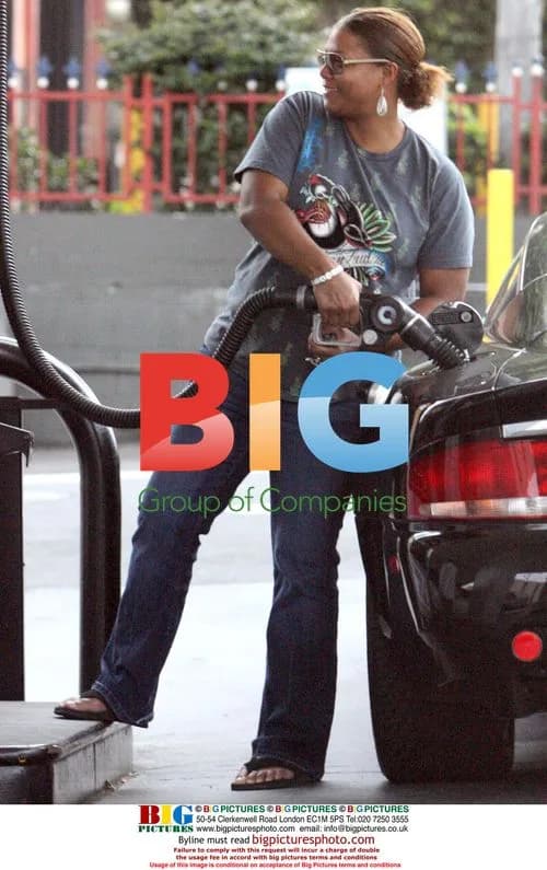 Unadorned Queen Latifah Pumps Gas