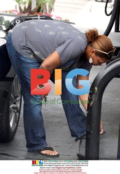 Queen Latifah Pumping Gas and Picking Toenails