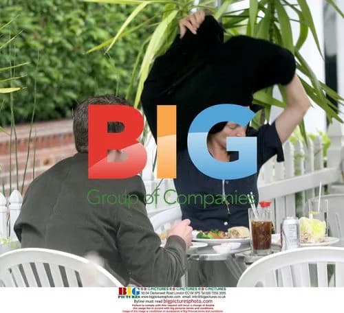 Uma Thurman Eats Lunch with Unidentified Man