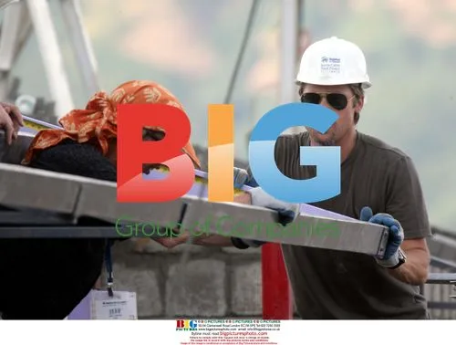 Brad Pitt helps build houses in India