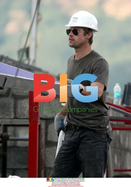 Brad Pitt helps build houses in India