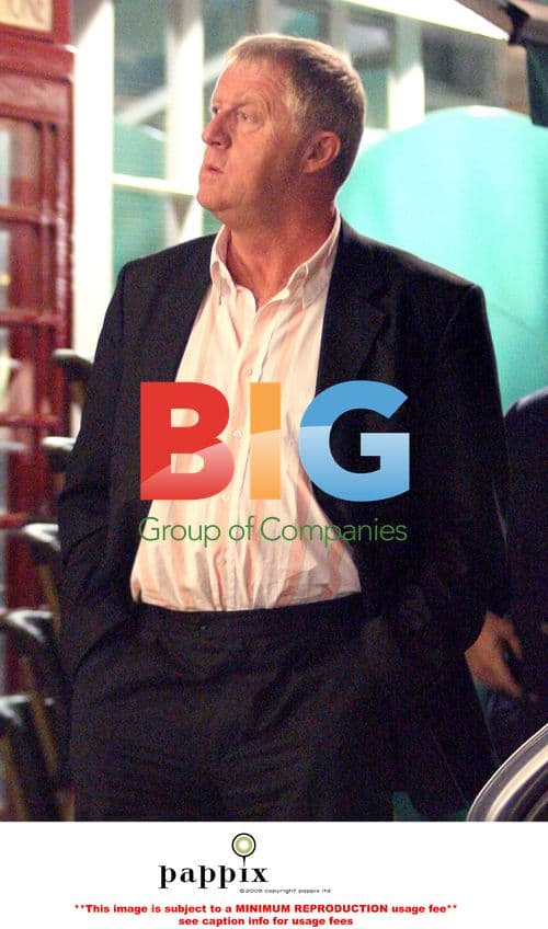 Chris Tarrant looking sad after buying meal