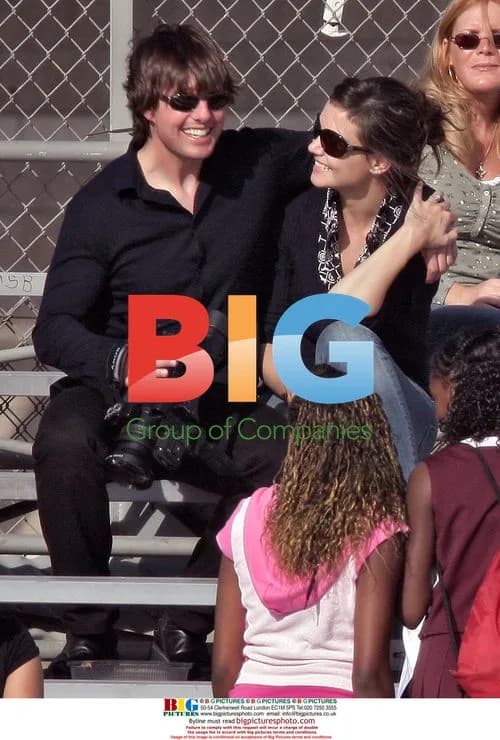 Tom Cruise and Katie Holmes watch son Conor's game