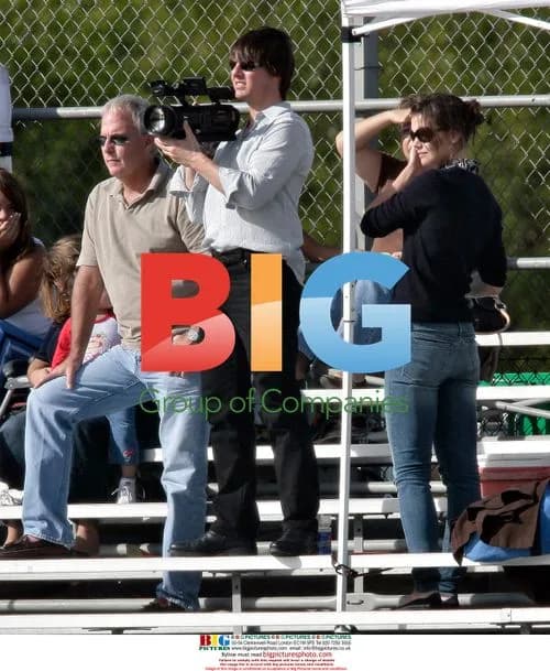 Tom Cruise and Katie Holmes watch son's football game