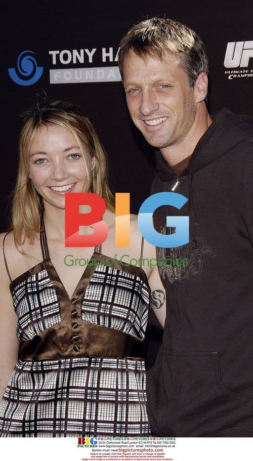 Tony Hawk and Wife at Stand Up for Skateparks