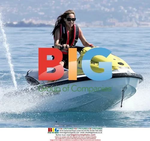 Myleene Klass rides jetski