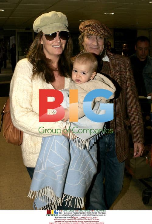 Rod Stewart, Penny Lancaster and baby Alistair at Heathrow