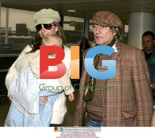 Rod Stewart, Penny Lancaster and baby Alistair depart Heathrow