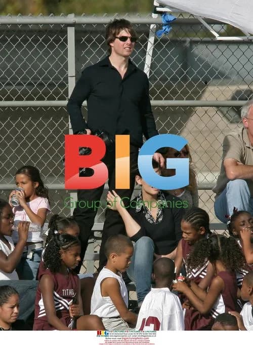Tom Cruise and Katie Holmes watch son's football game
