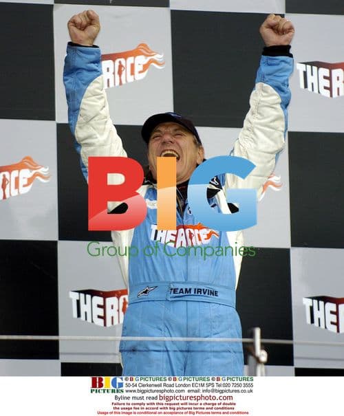 Winner Brian Johnson of AC/DC Celebrates on Podium