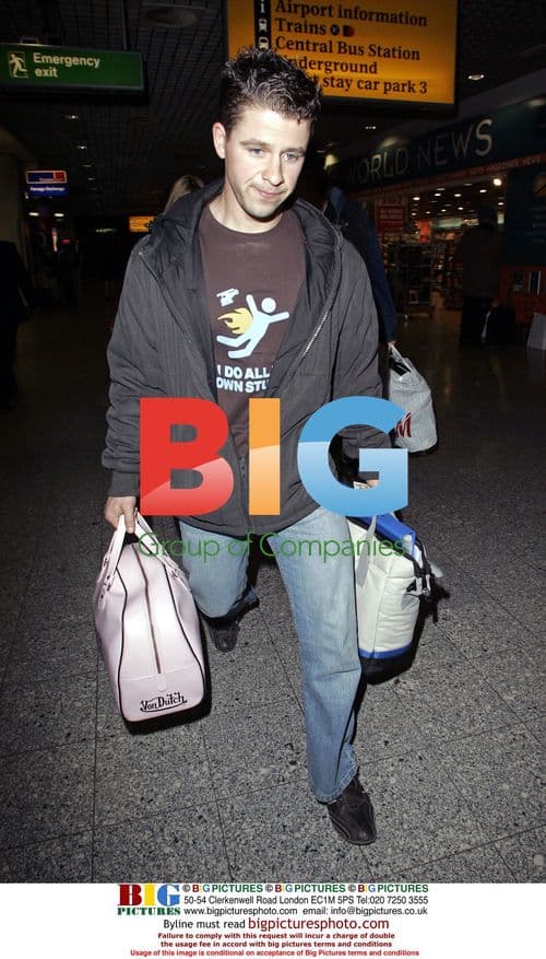 Heather Mills Arrives at Heathrow