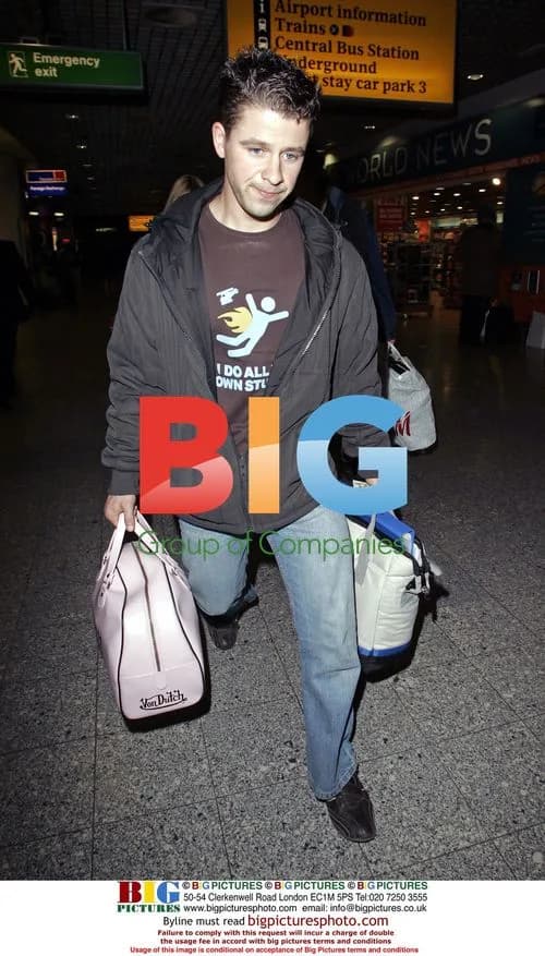 Heather Mills Arrives at Heathrow