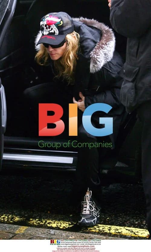 Madonna spotted out on rainy day in London