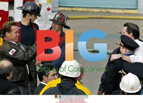 Arnold Schwarzenegger Photographs Newsom and Fire Chief
