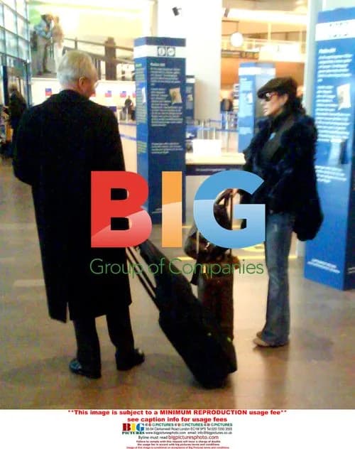 Sven Eriksson and Nancy dell'Olio spotted at Swedish airport