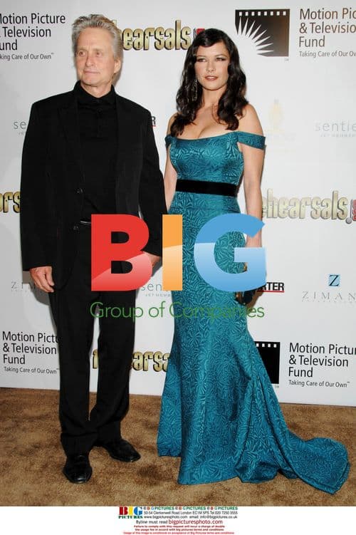 Catherine Zeta-Jones and Michael Douglas arrive for charity event