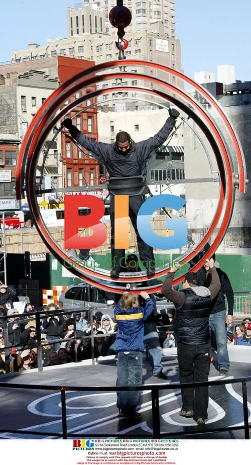 David Blaine Lifted 50 Feet by Crane
