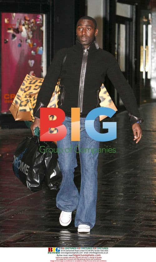 Andy Cole leaving Cricket store in Liverpool