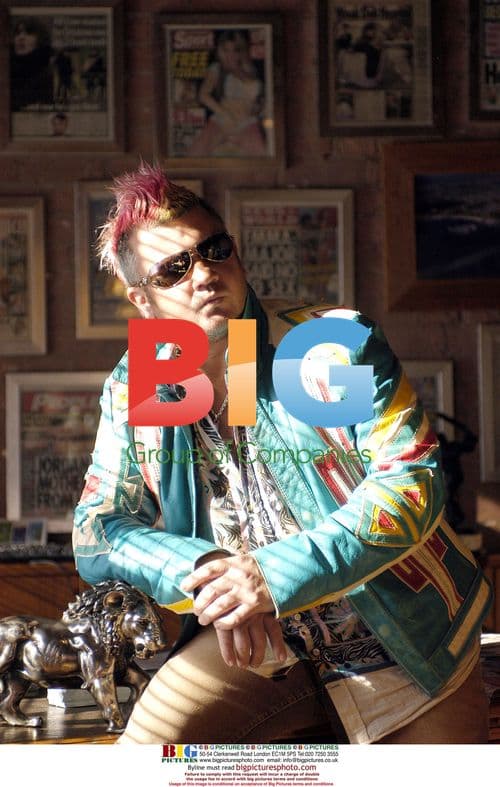 Darryn Lyons Poses in Big Pictures Studio