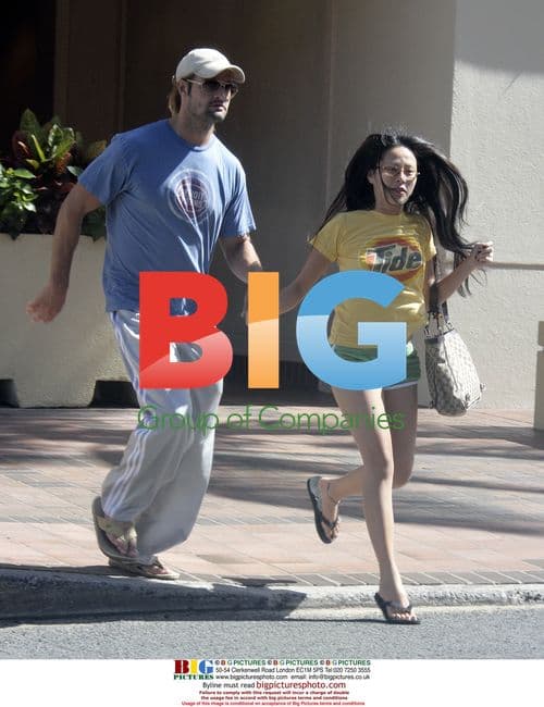 Josh Holloway and wife Yessica Kumala take a walk in Hawaii
