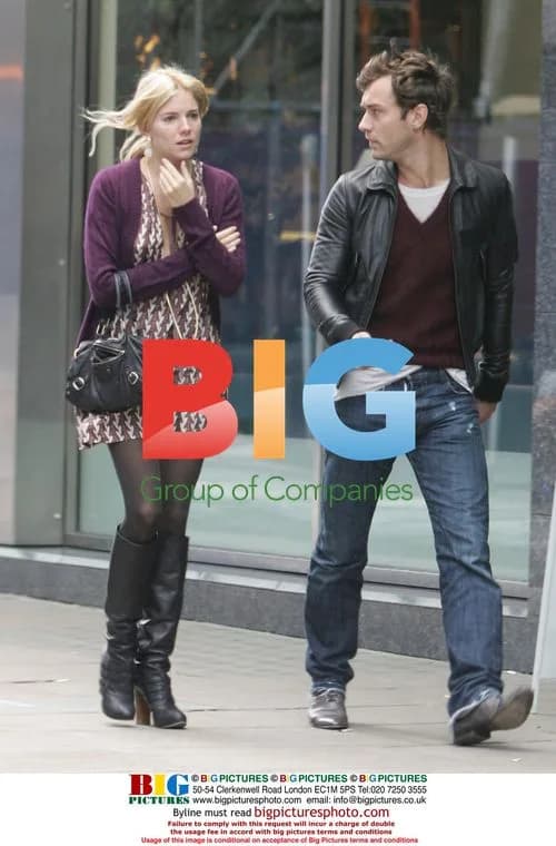 Jude Law and Sienna Miller walking in London