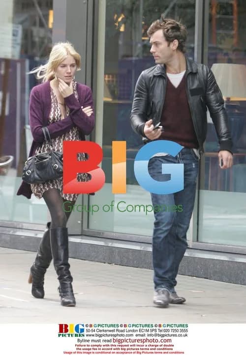 Jude Law and Sienna Miller walking in London