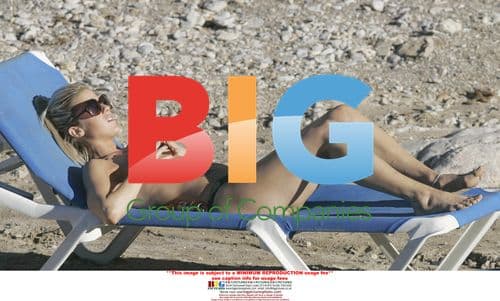 Kate Lawler Frolicking in Bikini on Holiday