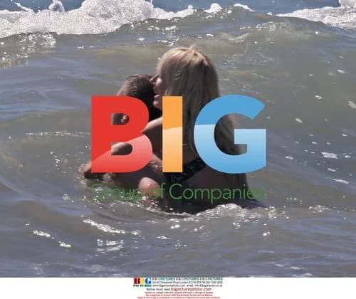 Jack Osbourne and Kimberly Stewart get frisky in the ocean
