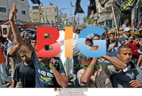 Palestinians carry body of Amin Sufi in Gaza