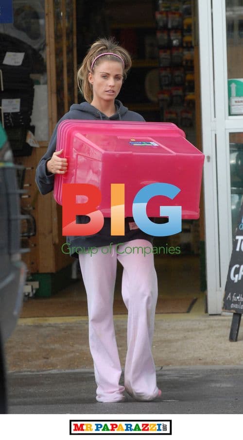 Katie Price Carrying Pink Box