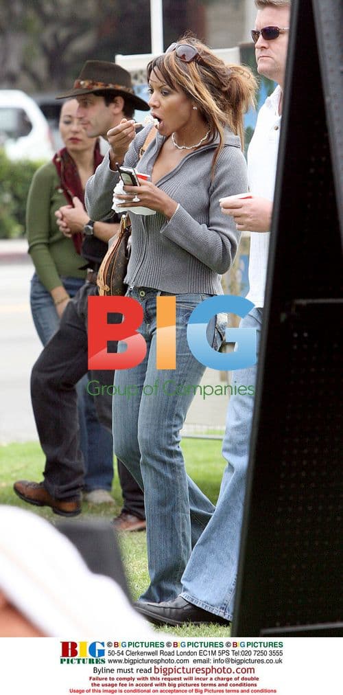 Traci Bingham strolls with fiance