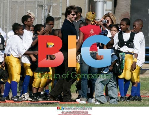 Tom Cruise and Katie Holmes at son's football game