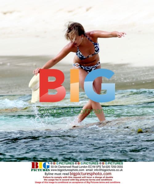 Tina O'Brien and Ryan Thomas at the beach in Greece