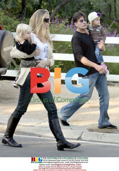 Denise Richards and Charlie Sheen with daughters at festival