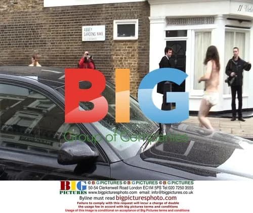 Madonna Leaves Gym, Man in Nappy Runs Up