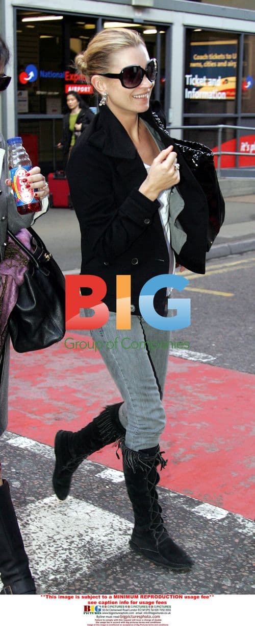 Jetsetter Kate Moss Arriving at Heathrow Airport