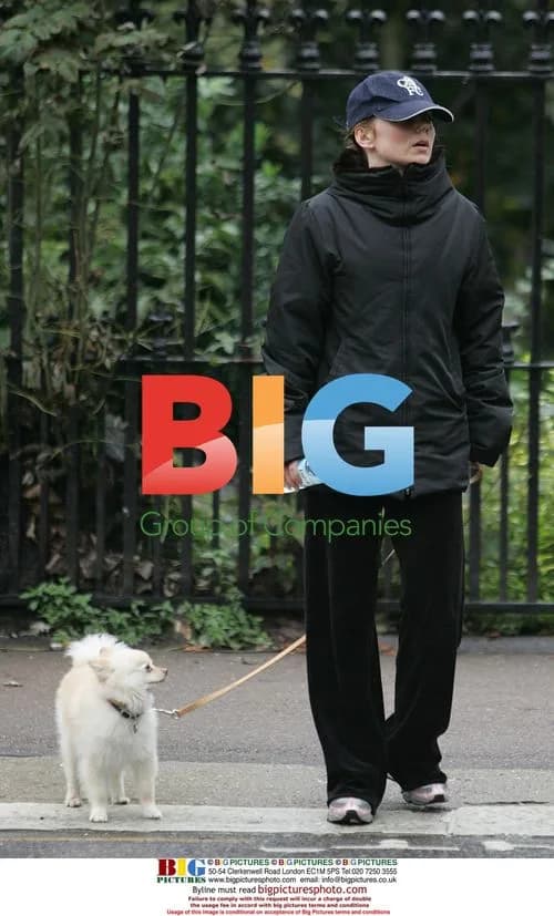 Geri Halliwell Strolling with Dog in Park