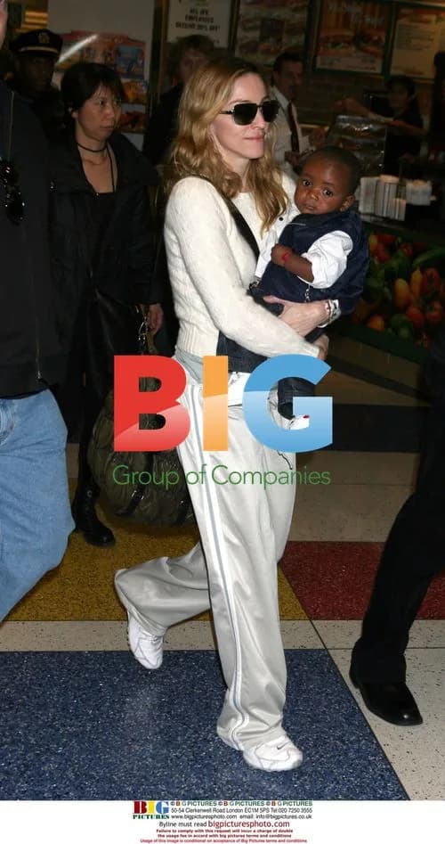 Madonna Arrives in NYC with Adopted Son