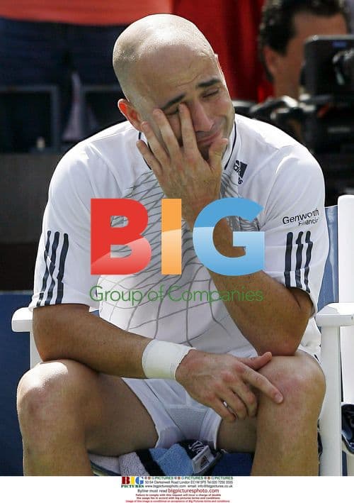 Andre Agassi cries after final career match