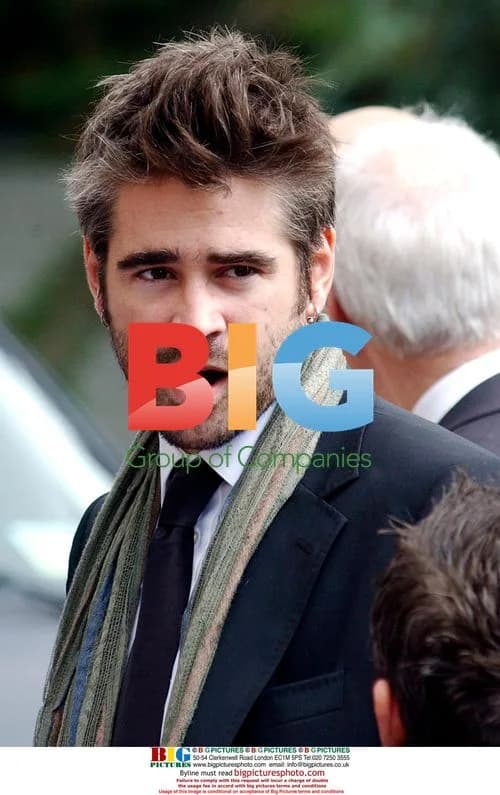 Colin Farrell attends wedding with mystery blonde