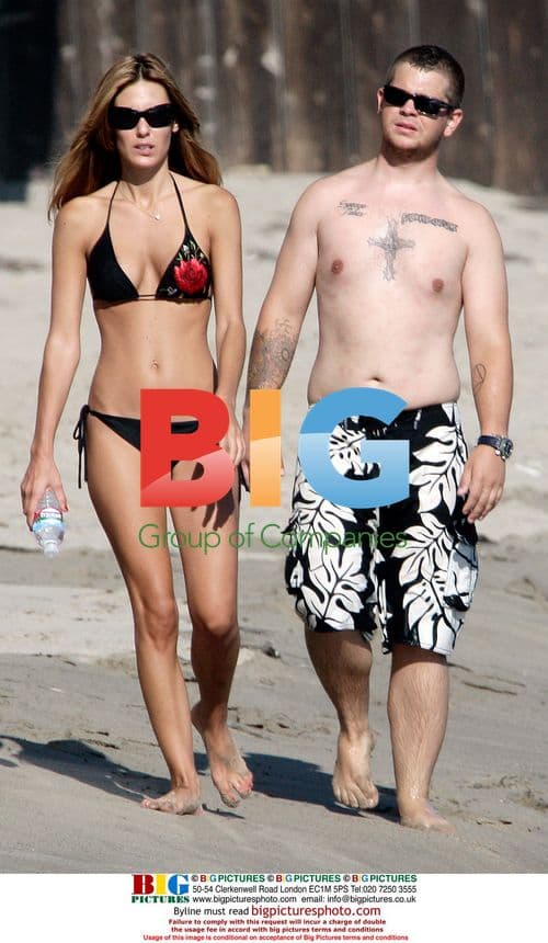 Kimberly Stewart and Jack Osbourne at the beach