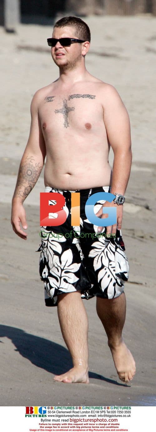 Kimberly Stewart and Jack Osbourne at the beach