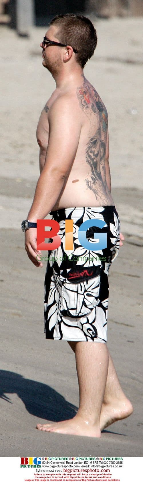 Kimberly Stewart and Jack Osbourne at the beach