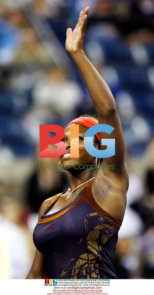 Serena Williams waves after U.S. Open defeat