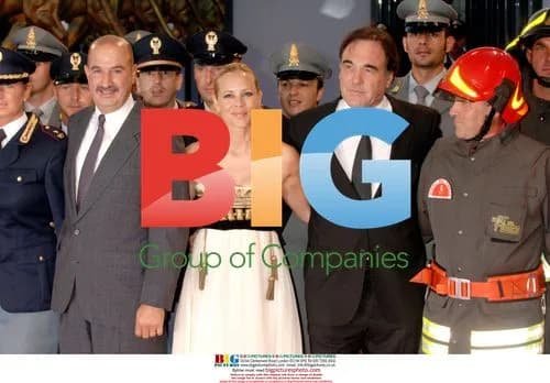 Maria Bello and Oliver Stone on Red Carpet